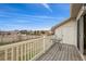A deck with a table has an interesting view of the nearby buildings at 18080 Becket Dr, Parker, CO 80134