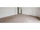 Spacious bedroom with neutral carpet and white walls at 18080 Becket Dr, Parker, CO 80134