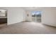 An airy bedroom that leads to the balcony and has an ensuite bath at 18080 Becket Dr, Parker, CO 80134