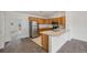 Modern kitchen with stainless steel appliances and a breakfast bar at 18080 Becket Dr, Parker, CO 80134