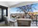 Relaxing balcony featuring wood flooring, furniture and views at 2524 Zenobia St, Denver, CO 80212
