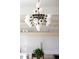 Modern chandelier with globe lights that offers a sophisticated style at 2524 Zenobia St, Denver, CO 80212