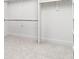 A walk-in closet with white walls and shelves, offering ample storage space at 2524 Zenobia St, Denver, CO 80212