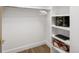 Organized walk-in closet with shelving and hanging rod, offering ample storage space at 2524 Zenobia St, Denver, CO 80212