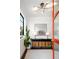 Bright entryway featuring modern lighting, accent furniture, and stylish decor at 2524 Zenobia St, Denver, CO 80212