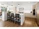 Modern kitchen with stainless steel appliances, quartz countertops and sleek cabinets at 2524 Zenobia St, Denver, CO 80212