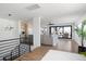 Bright living room featuring a staircase and a balcony at 2524 Zenobia St, Denver, CO 80212