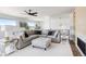 Bright living room featuring stylish furniture, a fireplace and views at 2524 Zenobia St, Denver, CO 80212