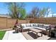 Inviting patio area with comfortable seating and a modern horizontal fence, perfect for outdoor relaxation at 2524 Zenobia St, Denver, CO 80212