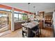 Bright kitchen with large window, kitchen island, stainless steel appliances and hardwood floor at 2042 Chesapeake Pl, Highlands Ranch, CO 80126