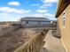 View of backyard with wooden fence and patio at 5242 Longs Peak St, Brighton, CO 80601