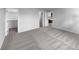 Bedroom with carpet flooring and access to a bathroom at 5242 Longs Peak St, Brighton, CO 80601