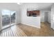 Dining area with tile flooring and access to a deck at 5242 Longs Peak St, Brighton, CO 80601