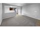 Open concept dining area with access to kitchen at 5242 Longs Peak St, Brighton, CO 80601