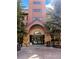 Grand building entrance with a porte cochere and well-maintained landscaping at 405 Village Rd # 101, Breckenridge, CO 80424