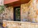Close-up of the stone exterior with window and ledge at 405 Village Rd # 101, Breckenridge, CO 80424
