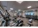 Well-equipped fitness center with cardio machines, weights, and mirrored walls at 405 Village Rd # 101, Breckenridge, CO 80424