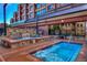 Inviting hot tubs and pool area with stone accents and comfortable seating for relaxation at 405 Village Rd # 101, Breckenridge, CO 80424
