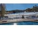 Outdoor pool with ski mountain views, perfect for relaxation and enjoying the scenery at 405 Village Rd # 101, Breckenridge, CO 80424