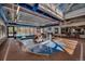 Indoor swimming pool area with decorative fountain and ample natural light at 405 Village Rd # 101, Breckenridge, CO 80424