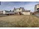 Spacious backyard with deck and storage shed at 1455 S Vaughn Cir, Aurora, CO 80012