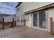 Deck with sliding glass doors leading to the house at 1455 S Vaughn Cir, Aurora, CO 80012