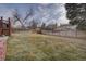 Grass backyard with wooden fence at 1455 S Vaughn Cir, Aurora, CO 80012