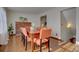 Bright dining room with hardwood floors and fireplace at 1455 S Vaughn Cir, Aurora, CO 80012