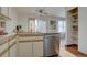 Kitchen with granite countertops and island at 1455 S Vaughn Cir, Aurora, CO 80012