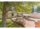Inviting backyard patio with stone flooring, perfect for outdoor dining and relaxation at 331 Sherman St, Longmont, CO 80501