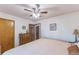 Bedroom with hardwood floors, vintage dresser, and a queen bed at 331 Sherman St, Longmont, CO 80501