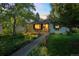 Inviting home with a covered porch, manicured lawn, and a walkway leading to the entrance at 331 Sherman St, Longmont, CO 80501