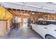 Spacious garage with exposed framing offering ample storage and parking space for vehicles and equipment at 331 Sherman St, Longmont, CO 80501