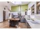 Well-lit kitchen with stainless steel appliances, butcher block island, and open layout perfect for cooking at 331 Sherman St, Longmont, CO 80501