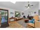 Bright living room with hardwood floors, vaulted ceilings, and a large window offering scenic views at 331 Sherman St, Longmont, CO 80501