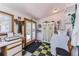 Practical mud room has a vintage cabinet, washer, and dryer, plus storage space at 331 Sherman St, Longmont, CO 80501
