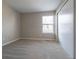 Bright bedroom with carpet and window that fills the space with light at 7790 W 87Th Drive Dr # D, Arvada, CO 80005