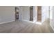 Bedroom view showcasing plush carpeting, a partial ensuite bathroom, and convenient kitchen access at 7790 W 87Th Drive Dr # D, Arvada, CO 80005