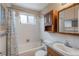 Full bathroom with tub, shower, and vanity at 9320 W 48Th Ave, Wheat Ridge, CO 80033