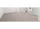 Spacious finished basement with neutral carpet, open layout, and ample lighting at 9117 Buck Hill Dr, Highlands Ranch, CO 80126