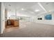 Spacious finished basement with recessed lighting and an adjacent kitchenette at 9117 Buck Hill Dr, Highlands Ranch, CO 80126