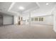 Finished basement with recessed lighting and an open floor plan with bar at 9117 Buck Hill Dr, Highlands Ranch, CO 80126