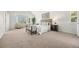 Serene bedroom with a bay window seating area and plush carpeting at 9117 Buck Hill Dr, Highlands Ranch, CO 80126