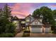 Beautiful two-story brick home with lush landscaping and a cozy atmosphere at 9117 Buck Hill Dr, Highlands Ranch, CO 80126