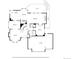 Detailed first floor plan showcasing the layout of the kitchen, living room, and garage at 9117 Buck Hill Dr, Highlands Ranch, CO 80126