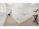 Upstairs hallway featuring a modern chandelier and access to bedrooms at 9117 Buck Hill Dr, Highlands Ranch, CO 80126