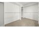 Spacious walk-in closet with custom shelving providing ample storage space at 9117 Buck Hill Dr, Highlands Ranch, CO 80126