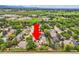 Stunning aerial view of the property showcasing lush landscaping and mature trees at 5420 Crestone Cir, Boulder, CO 80301