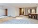 Spacious finished basement with a bar area and stairway to upper floors, perfect for entertaining at 5420 Crestone Cir, Boulder, CO 80301