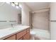 Updated bathroom featuring modern fixtures, a vanity, and shower-tub combo at 5420 Crestone Cir, Boulder, CO 80301